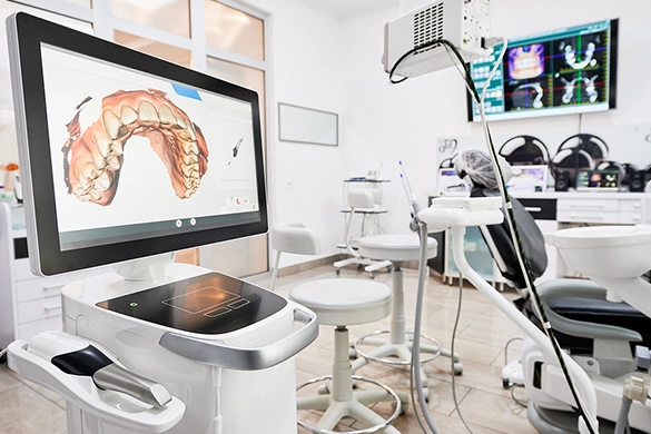 Dental Office Full Of Technology Showing A Dental Scan